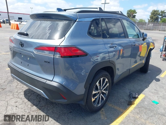 2024 Toyota Corolla Cross XLE with VIN 7MUDAAAG4RV112364, listed as a IAAI auction lot 42272971 with 2,764 mi miles and . Bid and sale history available at DreamBid. Image 4.
