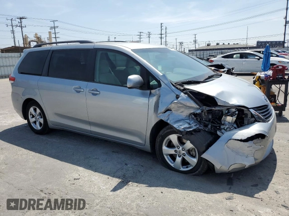 2014 Toyota Sienna LE AAS with VIN 5TDKK3DC1ES504232, listed as a Copart auction lot 54169005 with 103,724 mi miles and Salvage Title. Bid and sale history available at DreamBid. Image 4.