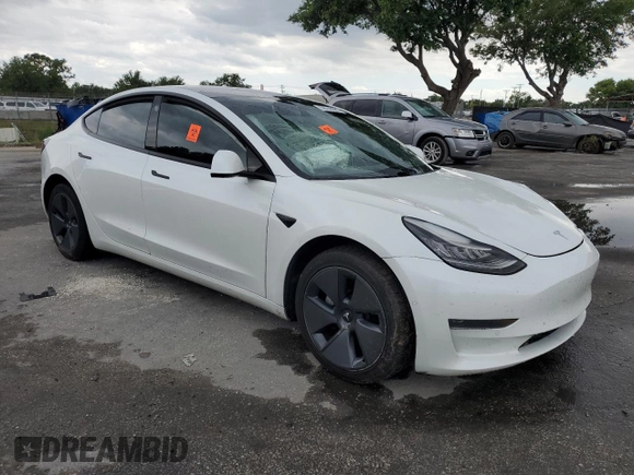 2021 Tesla Model 3 Standard Range Plus z VIN 5YJ3E1EA2MF859832, wystawiony jako Copart lot #56743865 z przebiegiem 77 025 mil mil oraz Nie do naprawy. Historia ofert i sprzedaży dostępna na DreamBid. Obrazek 4.