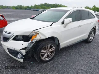 2013 Acura RDX Technology with VIN 5J8TB3H51DL017551, listed as a IAAI auction lot 41464240 with 122,863 mi miles and . Bid and sale history available at DreamBid. Image 2.