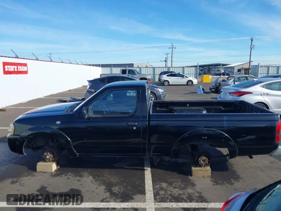 2001 Nissan Frontier XE z VIN 1N6DD21S41C399865, wystawiony jako IAAI lot #41569843 z przebiegiem Nie podano mil oraz . Historia ofert i sprzedaży dostępna na DreamBid. Obrazek 14.