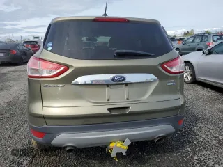 2013 Ford Escape SEL with VIN 1FMCU9H94DUD55370, listed as a Copart auction lot 52199415 with 79,462 mi miles and Salvage Title. Bid and sale history available at DreamBid. Image 6.
