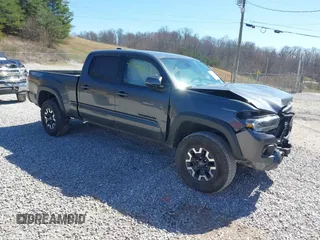 2023 Toyota Tacoma SR5 z VIN 3TMDZ5BN1PM163714, wystawiony jako IAAI lot #41814446 z przebiegiem 14 069 mil mil oraz . Historia ofert i sprzedaży dostępna na DreamBid. Obrazek 1.