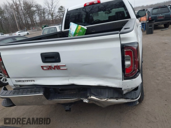 2018 GMC Sierra 1500 SLT z VIN 3GTU2NEC1JG402263, wystawiony jako IAAI lot #41786328 z przebiegiem 100 097 mil mil oraz . Historia ofert i sprzedaży dostępna na DreamBid. Obrazek 6.