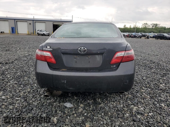 2009 Toyota Camry LE z VIN 4T1BK46K69U091909, wystawiony jako Copart lot #56214505 z przebiegiem 157 133 mil mil oraz Czysty tytuł • Clean title. Historia ofert i sprzedaży dostępna na DreamBid. Obrazek 6.
