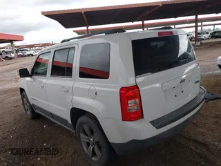 2014 Jeep Patriot High Altitude with VIN 1C4NJPFA0ED667162, listed as a IAAI auction lot 41752271 with 131,038 mi miles and . Bid and sale history available at carsss.com. Image 3.