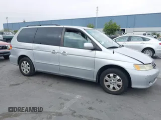 2003 Honda Odyssey EX-L with VIN 5FNRL18913B117504, listed as a IAAI auction lot 42772119 with 96,180 mi miles and . Bid and sale history available at DreamBid. Image 1.