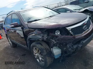 2011 Kia Sorento EX with VIN 5XYKUDA2XBG131874, listed as a IAAI auction lot 41901492 with 170,179 mi miles. Bid and sale history available at carsss.com. Image 1.