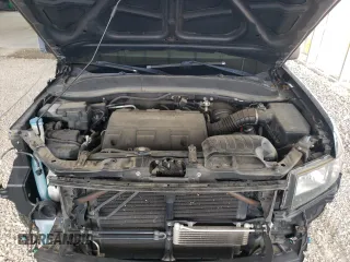 2012 Honda Ridgeline Sport z VIN 5FPYK1F76CB001867, wystawiony jako Copart lot #57944775 z przebiegiem 92 900 mil mil oraz Szkoda całkowita • Salvage title. Historia ofert i sprzedaży dostępna na DreamBid. Obrazek 11.