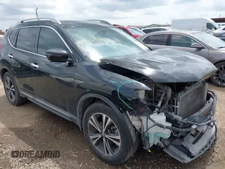 2017 Nissan Rogue SV with VIN 5N1AT2MT7HC877442, listed as a IAAI auction lot 42099540 with 148,526 mi miles and . Bid and sale history available at DreamBid. Image 1.