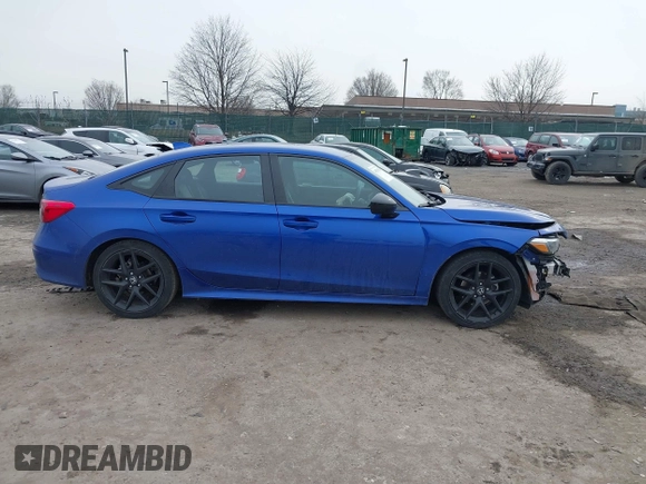 2023 Honda Civic Sport z VIN 2HGFE2F56PH502559, wystawiony jako IAAI lot #41558054 z przebiegiem 48 961 mil mil oraz . Historia ofert i sprzedaży dostępna na DreamBid. Obrazek 13.