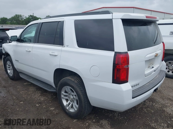 2018 Chevrolet Tahoe LT with VIN 1GNSCBKC0JR356276, listed as a IAAI auction lot 41961957 with 120,429 mi miles and . Bid and sale history available at DreamBid. Image 3.