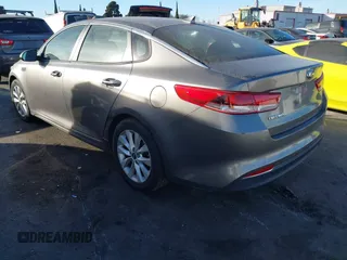 2018 Kia Optima LX with VIN 5XXGT4L32JG256921, listed as a IAAI auction lot 41389850 with 91,013 mi miles and . Bid and sale history available at DreamBid. Image 3.