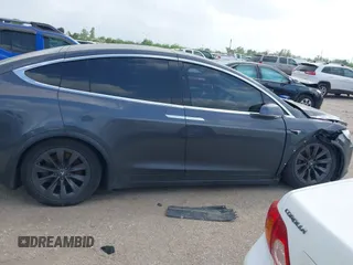 2018 Tesla Model X 75D with VIN 5YJXCDE21JF139712, listed as a IAAI auction lot 41905326 with Not Provided miles and . Bid and sale history available at carsss.com. Image 13.