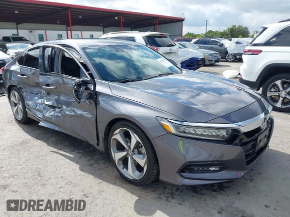 2020 Honda Accord Touring z VIN 1HGCV2F93LA023062, wystawiony jako IAAI lot #42596772 z przebiegiem 53 586 mil mil oraz . Historia ofert i sprzedaży dostępna na DreamBid. Obrazek 1.