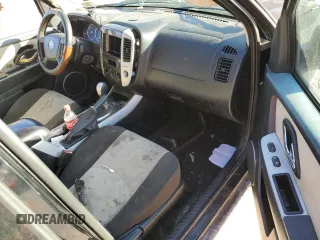2007 Mercury Mariner Luxury with VIN 4M2CU91187KJ05567, listed as a Copart auction lot 48353025 with Not provided miles and Salvage title. Bid and sale history available at DreamBid. Image 8.