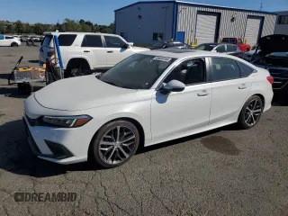 2022 Honda Civic Touring with VIN 2HGFE1F90NH311259, listed as a Copart auction lot 58038155 with 14,917 mi miles and Salvage title. Bid and sale history available at DreamBid. Image 1.