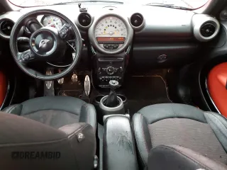 2012 MINI Countryman S with VIN WMWZC3C58CWM27870, listed as a Copart auction lot 46924325 with 117,911 mi miles and Salvage Title. Bid and sale history available at DreamBid. Image 8.