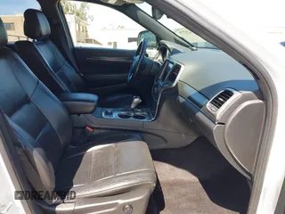 2018 Jeep Grand Cherokee Limited with VIN 1C4RJFBG3JC245943, listed as a IAAI auction lot 42287279 with 107,719 mi miles and . Bid and sale history available at DreamBid. Image 5.