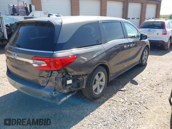 2020 Honda Odyssey EX with VIN 5FNRL6H59LB068868, listed as a IAAI auction lot 41930832 with 64,872 mi miles and . Bid and sale history available at DreamBid. Image 4.