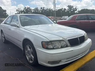 2000 Infiniti Q45 z VIN JNKBY31A0YM700503, wystawiony jako Copart lot #59358045 z przebiegiem 121 244 mil mil oraz Tytuł czysty. Historia ofert i sprzedaży dostępna na DreamBid. Obrazek 1.
