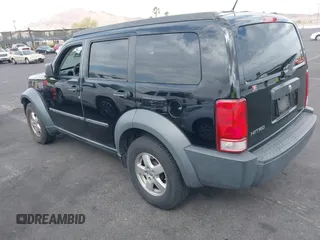 2007 Dodge Nitro SXT with VIN 1D8GT28K27W502900, listed as a IAAI auction lot 42077428 with 166,114 mi miles. Bid and sale history available at carsss.com. Image 3.