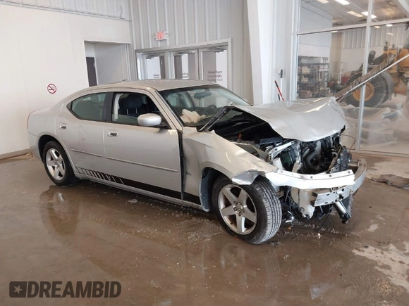2010 Dodge Charger SXT with VIN 2B3CA3CV1AH291075, listed as a IAAI auction lot 41576216 with 144,602 mi miles. Bid and sale history available at carsss.com. Image 1.