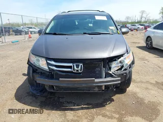 2016 Honda Odyssey SE with VIN 5FNRL5H34GB043343, listed as a IAAI auction lot 42096360 with 140,878 mi miles and . Bid and sale history available at DreamBid. Image 6.