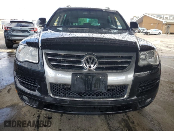 2010 Volkswagen Touareg VR6 with VIN WVGBF7A98AD001321, listed as a Copart auction lot 48949685 with 101,944 mi miles and Salvage Title. Bid and sale history available at DreamBid. Image 5.