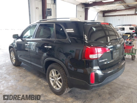 2014 Kia Sorento LX with VIN 5XYKTCA64EG541574, listed as a IAAI auction lot 42067910 with 144,234 mi miles and . Bid and sale history available at carsss.com. Image 3.