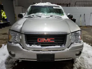 2005 GMC Envoy SLT with VIN 1GKDT13SX52287052, listed as a Copart auction lot 44387855 with 0 mi miles and Salvage Title. Bid and sale history available at carsss.com. Image 5.