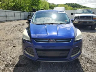 2013 Ford Escape SEL z VIN 1FMCU9HX7DUB98268, wystawiony jako Copart lot #55469915 z przebiegiem 123 619 mil mil oraz Szkoda całkowita • Salvage title. Historia ofert i sprzedaży dostępna na DreamBid. Obrazek 5.