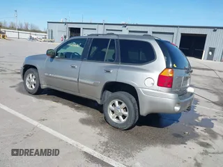 2002 GMC Envoy SLT z VIN 1GKDT13S122114452, wystawiony jako IAAI lot #42048616 z przebiegiem 259 545 mil mil oraz . Historia ofert i sprzedaży dostępna na DreamBid. Obrazek 3.