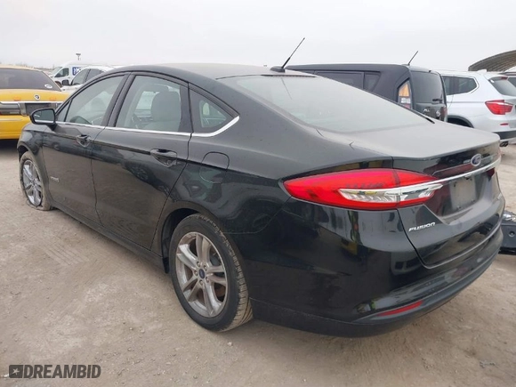 2018 Ford Fusion Hybrid S with VIN 3FA6P0UU9JR100852, listed as a IAAI auction lot 41516157 with 63,458 mi miles. Bid and sale history available at carsss.com. Image 3.