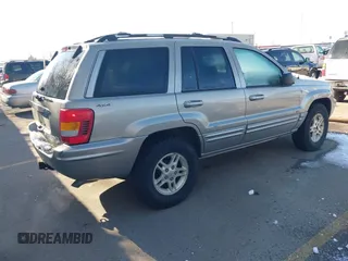 2001 Jeep Grand Cherokee Limited with VIN 1J4GW58N91C688438, listed as a IAAI auction lot 41830334 with 184,420 mi miles. Bid and sale history available at carsss.com. Image 4.
