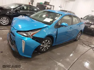 2022 Toyota Prius LE with VIN JTDL9MFU0N3039049, listed as a IAAI auction lot 41366833 with 24,175 mi miles. Bid and sale history available at carsss.com. Image 2.