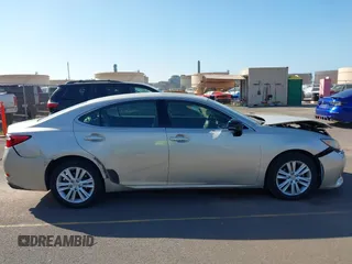 2013 Lexus ES 4dr Sdn with VIN JTHBK1GG1D2023369, listed as a IAAI auction lot 41539886 with 136,492 mi miles. Bid and sale history available at carsss.com. Image 13.