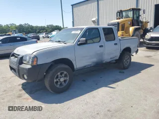 2003 Nissan Frontier XE with VIN 1N6ED27T23C456197, listed as a Copart auction lot 57393515 with 181,596 mi miles and Salvage title. Bid and sale history available at DreamBid. Image 1.