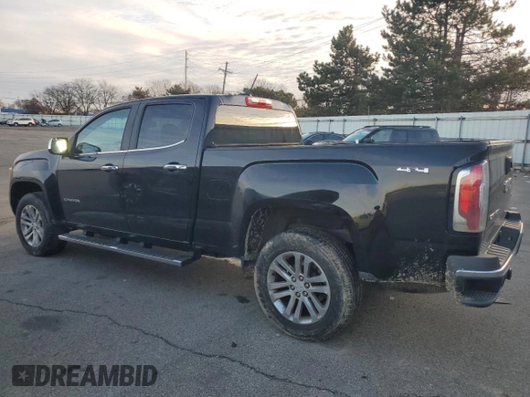 2015 GMC Canyon 4WD SLT z VIN 1GTG6CE34F1121540, wystawiony jako Copart lot #86190774 z przebiegiem 141 381 mil mil oraz Czysty tytuł • Clean title. Historia ofert i sprzedaży dostępna na DreamBid. Obrazek 2.