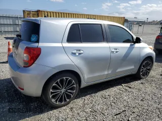 2010 Scion xD with VIN JTKKU4B40A1005613, listed as a Copart auction lot 56074605 with 205,505 mi miles and Clean Title. Bid and sale history available at DreamBid. Image 3.