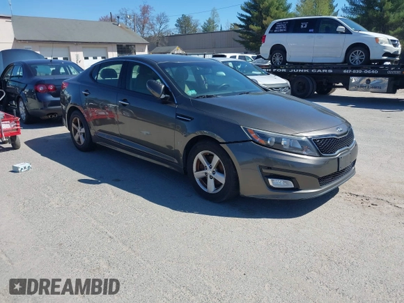 2015 Kia Optima LX with VIN 5XXGM4A74FG396236, listed as a IAAI auction lot 42165862 with 127,383 mi miles. Bid and sale history available at carsss.com. Image 1.