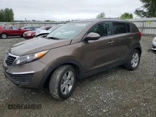 2012 Kia Sportage LX with VIN KNDPBCA20C7346460, listed as a Copart auction lot 64416755 with 61,283 mi miles and Salvage title. Bid and sale history available at DreamBid. Image 1.