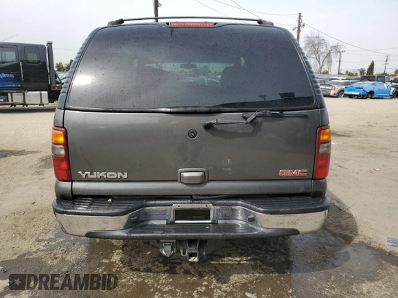 2002 GMC Yukon SLT z VIN 1GKEC13TX2R241172, wystawiony jako Copart lot #47281635 z przebiegiem Nie podano mil oraz Szkoda całkowita • Salvage title. Historia ofert i sprzedaży dostępna na DreamBid. Obrazek 6.