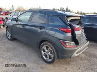 2023 Hyundai Kona SEL with VIN KM8K6CAB5PU935683, listed as a IAAI auction lot 41680852 with 59,057 mi miles and . Bid and sale history available at DreamBid. Image 3.