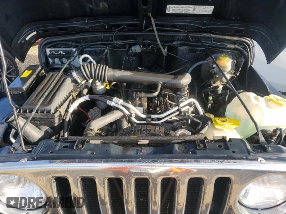2003 Jeep Wrangler X with VIN 1J4FA39S73P340698, listed as a Copart auction lot 73888624 with 49,677 mi miles and Salvage Title. Bid and sale history available at carsss.com. Image 12.
