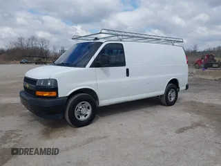 2018 Chevrolet Express Cargo Van with VIN 1GCWGAFP6J1336229, listed as a IAAI auction lot 42022722 with 99,005 mi miles. Bid and sale history available at carsss.com. Image 2.