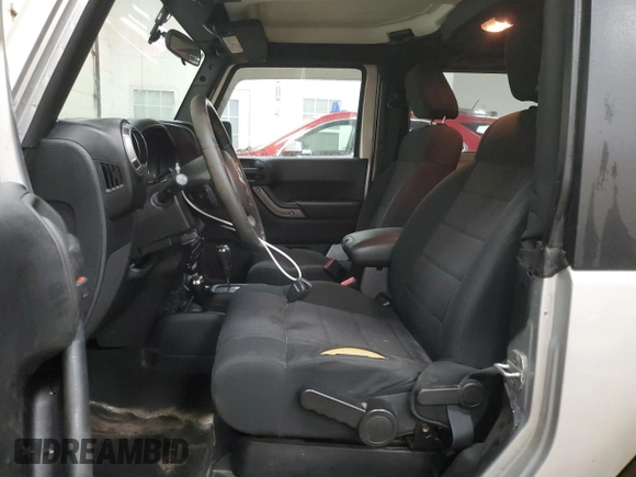 2012 Jeep Wrangler Sport with VIN 1C4AJWAGXCL133013, listed as a Copart auction lot 59788325 with 141,015 mi miles and Clean title. Bid and sale history available at DreamBid. Image 7.