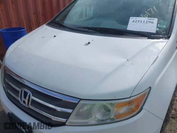 2011 Honda Odyssey EX-L with VIN 5FNRL5H60BB026171, listed as a IAAI auction lot 42511296 with 288,827 mi miles and . Bid and sale history available at DreamBid. Image 17.