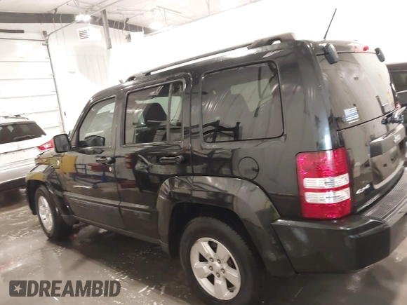 2009 Jeep Liberty Sport with VIN 1J8GN28K29W537201, listed as a IAAI auction lot 41740471 with 151,082 mi miles. Bid and sale history available at carsss.com. Image 14.