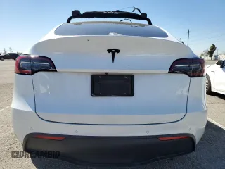 2022 Tesla Model Y Long Range with VIN 7SAYGDEE4NF357428, listed as a Copart auction lot 50345715 with 45,168 mi miles and Salvage Title. Bid and sale history available at carsss.com. Image 6.